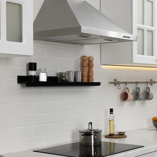 Chimney style cooker hood in a modern kitchen