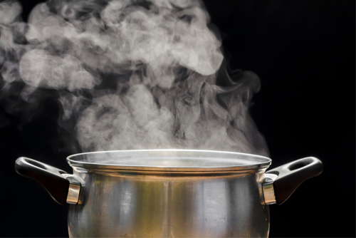 Cooker Hood Extracting Steam from Cooking Pot