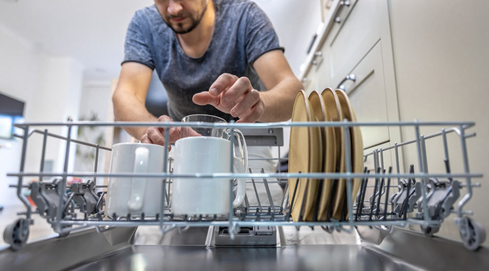 Man using Integrated Dishwasher
