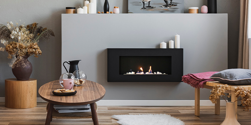 black glass electric fireplace wall mounted in cosy home