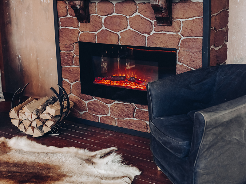 black glass curved electric fireplace wall mounted in cosy home