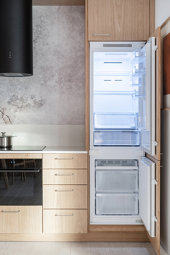 Integrated fridge freezer in modern kitchen
