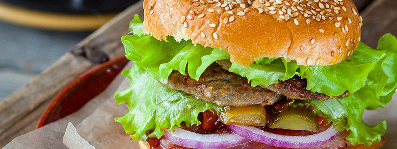 Burger cooked on a portable grill